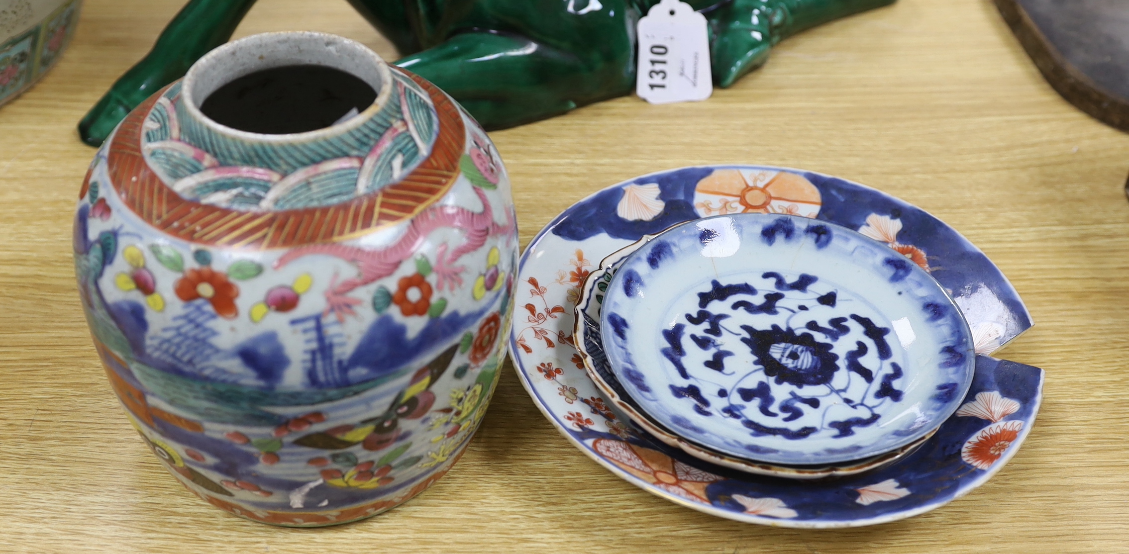 A Chinese famille rose vase, 16cm tall, together with a Japanese Imari plate and two others